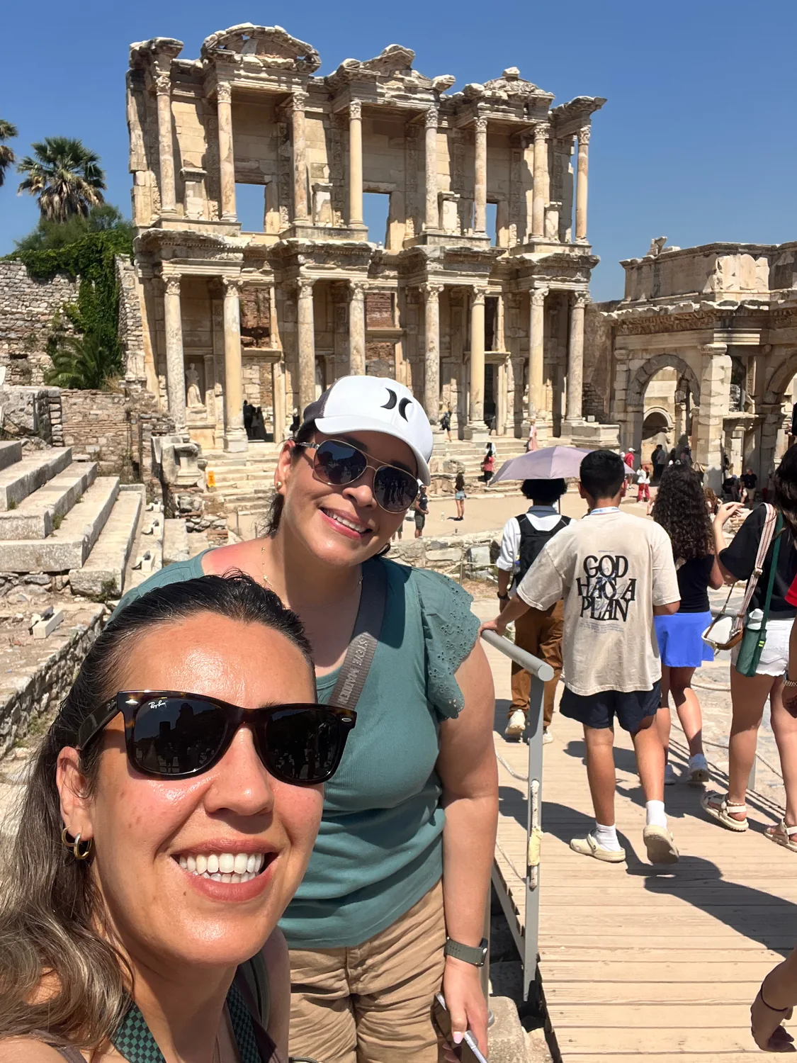 Eda with a traveler at the Library of Celsus