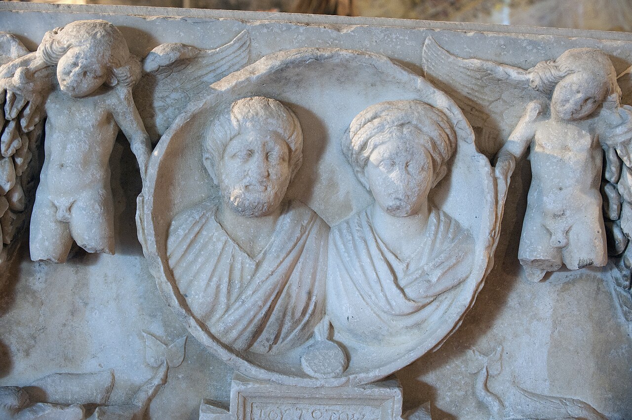 Carved portraits and figures on a garlanded sarcophagus from Laodiceia displayed at the Hierapolis museum