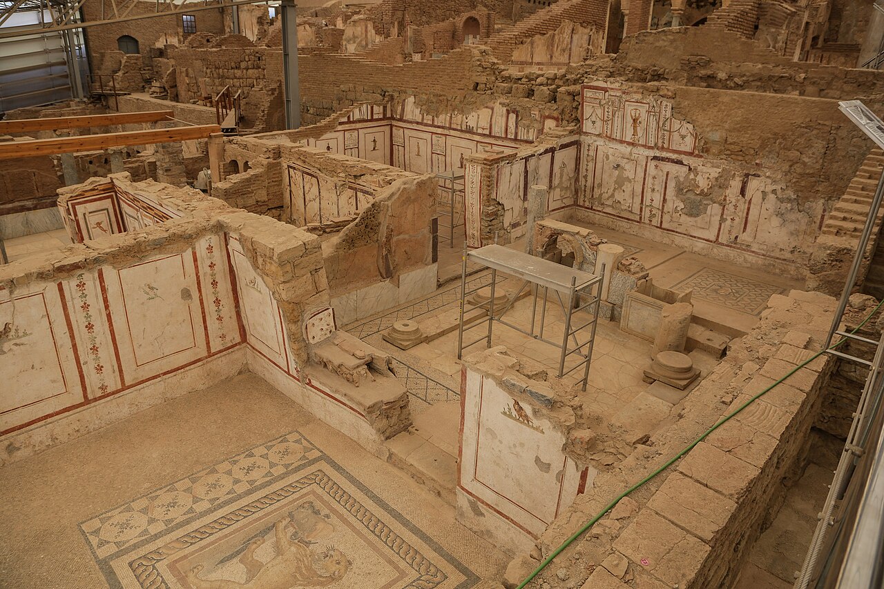 Overhead view of preserved rooms, painted walls and mosaic floors inside the Terrace Houses at Ephesus